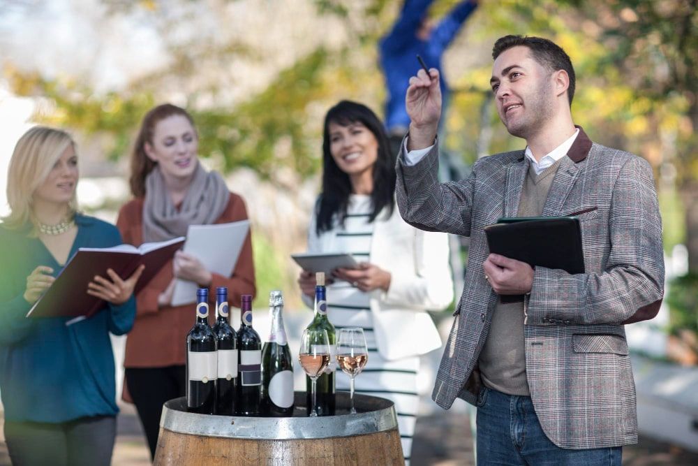 sales-people-preparing-wine-selling-event-wine-estate-min